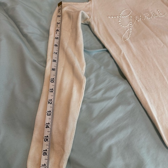Guess Women’s XS Cold Shoulder. White Faux Pearl Logo Long-Sleeve Top. - Picture 5 of 9